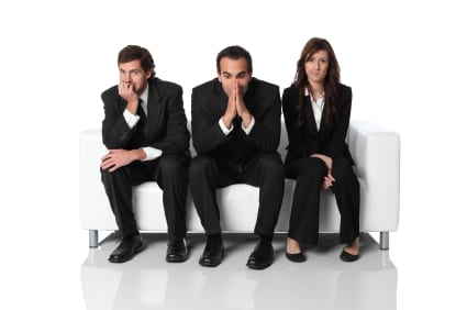 three employees waiting to interview
