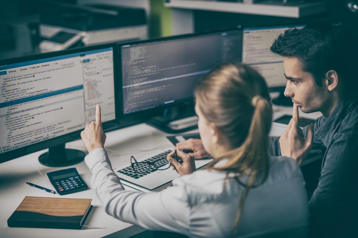 two people developing a website