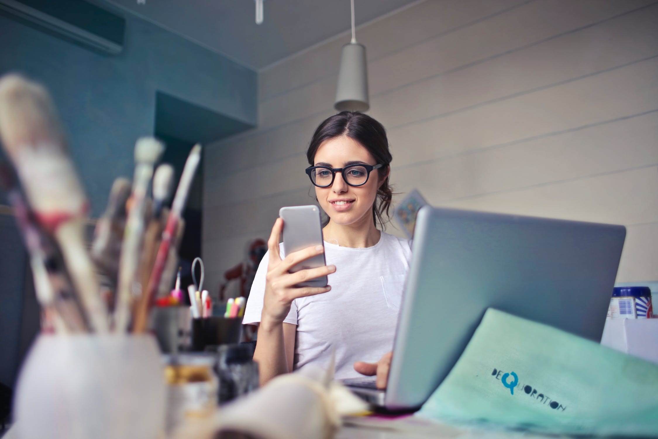 woman working from home on cell phone